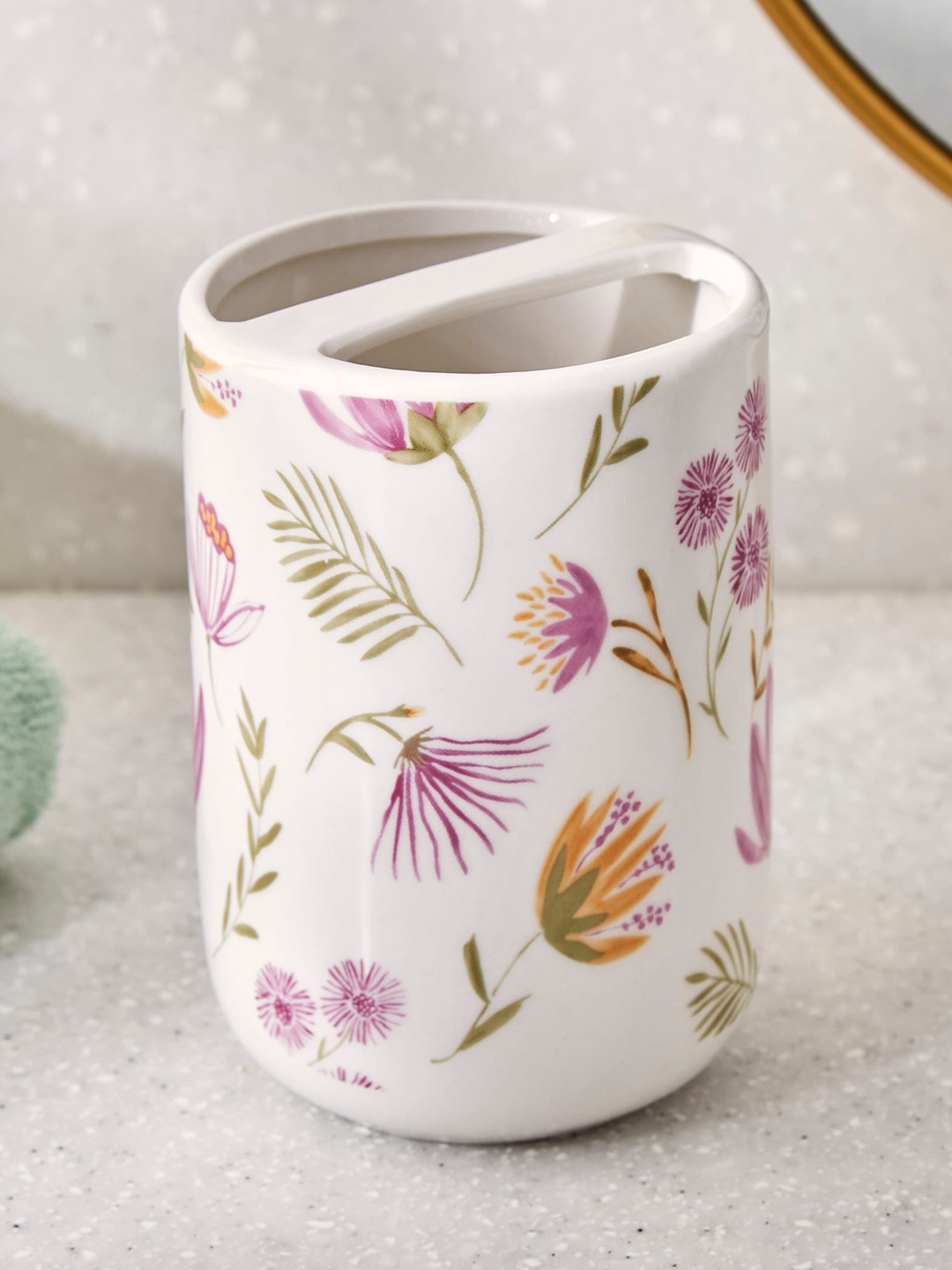 

Home Centre Mekong White & Purple Floral Printed Ceramic Toothbrush Holder