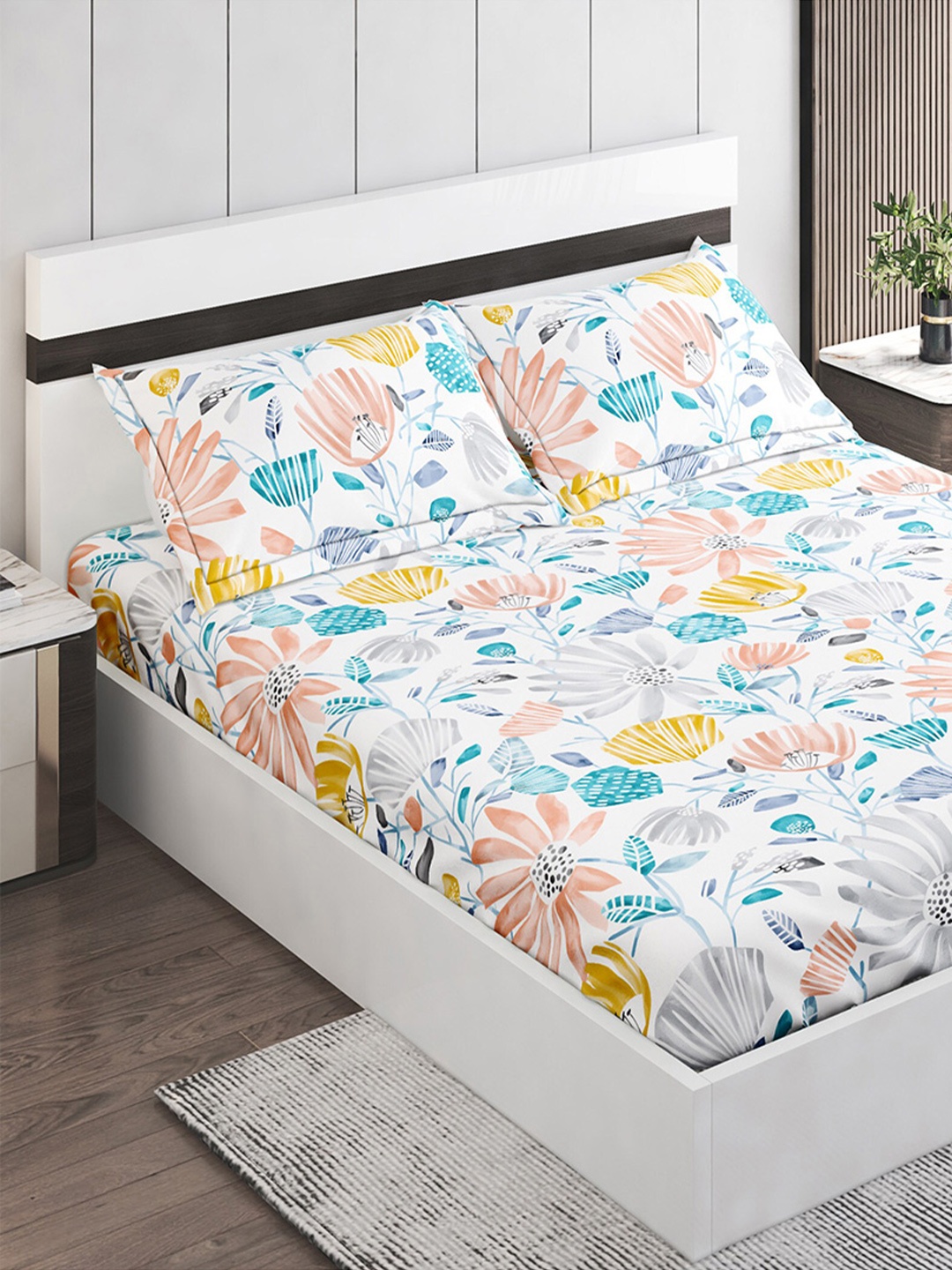 

Home Centre Pacific Juniper White Floral Cotton 144 TC Queen Bedsheet With 2 Pillow Covers