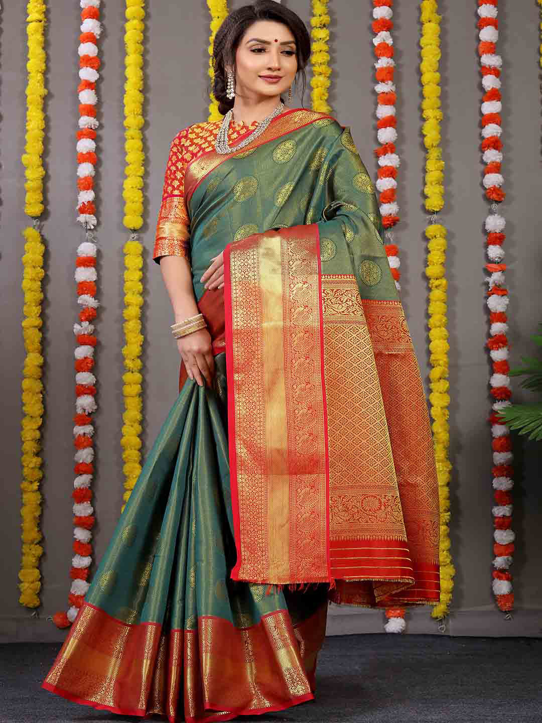 

Mitera Green & Red Ethnic Motifs Woven Design Zari Saree