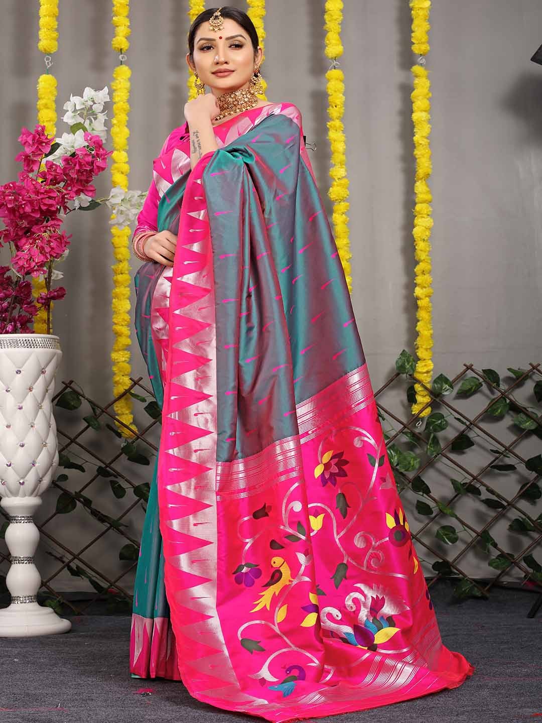 

Mitera Green & Pink Woven Design Zari Art Silk Saree