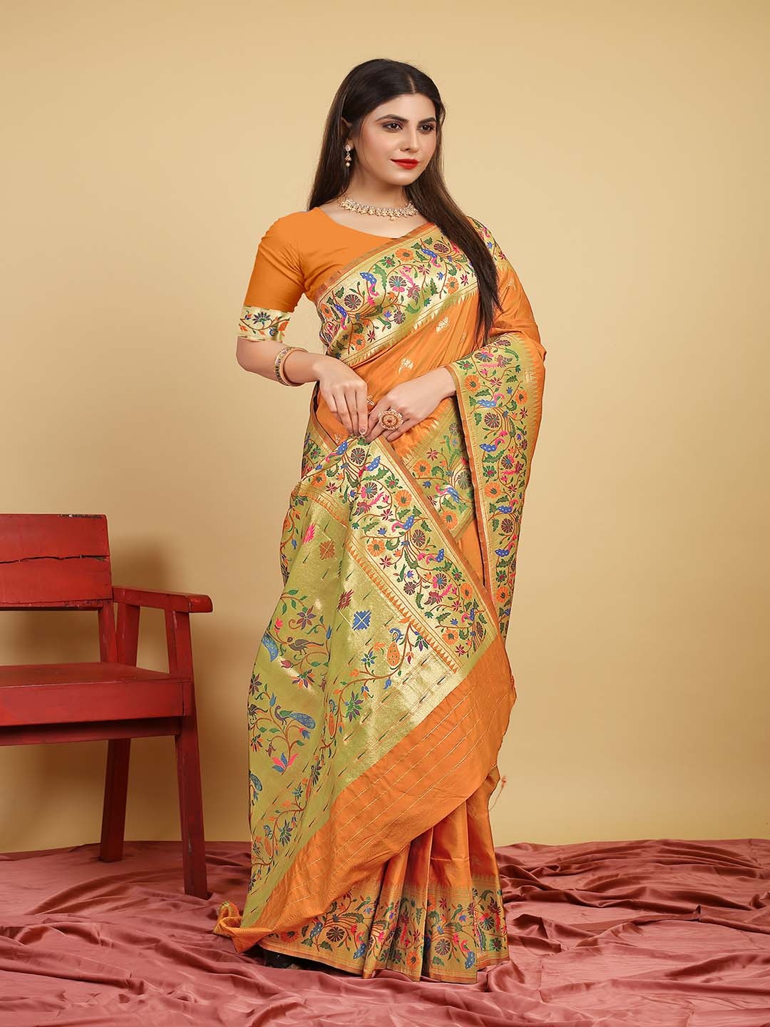 

Mitera Orange & Gold-Toned Ethnic Motifs Woven Design Zari Saree