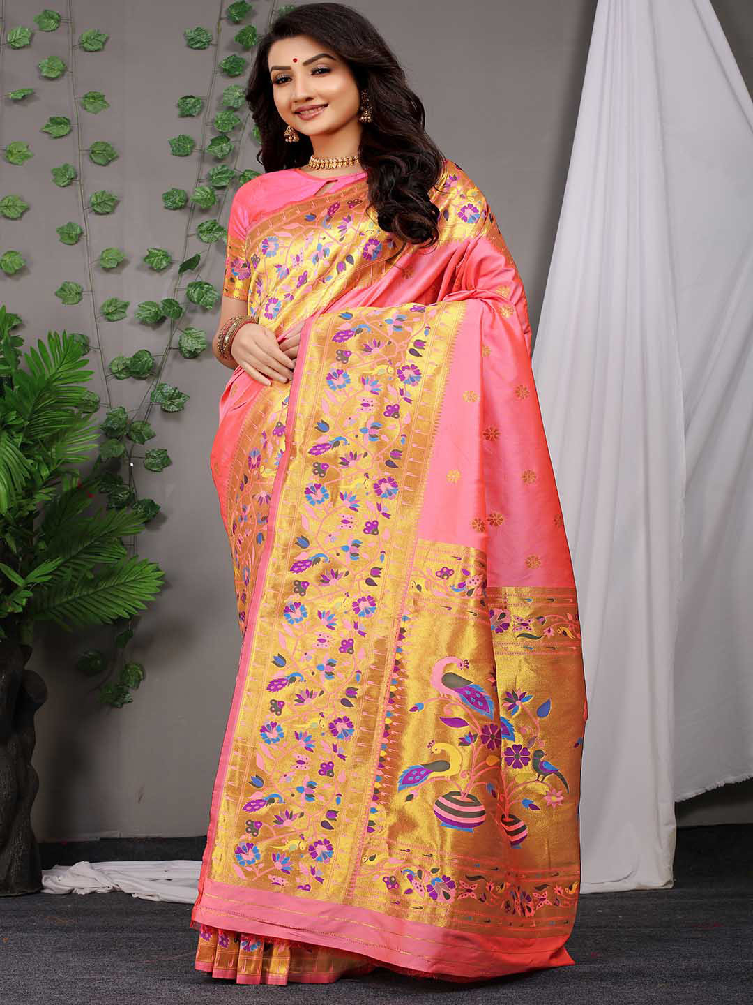 

Mitera Pink & Blue Ethnic Motifs Woven Design Zari Saree