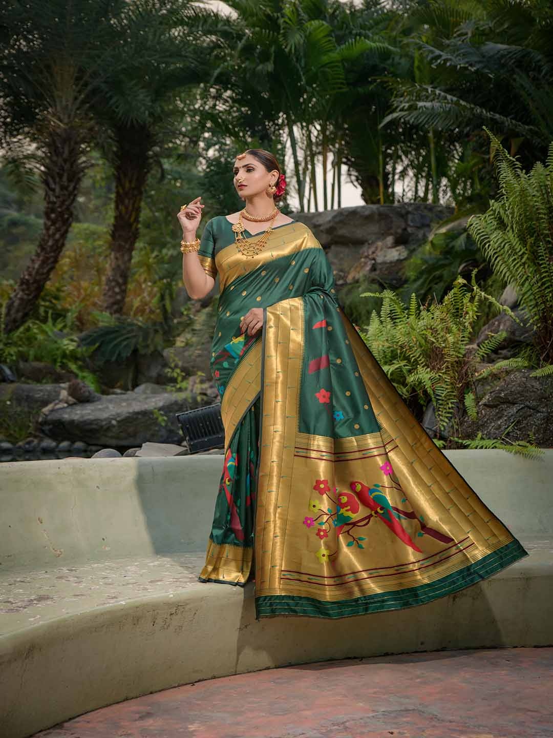 

Mitera Green Ethnic Motifs Woven Design Art Silk Saree
