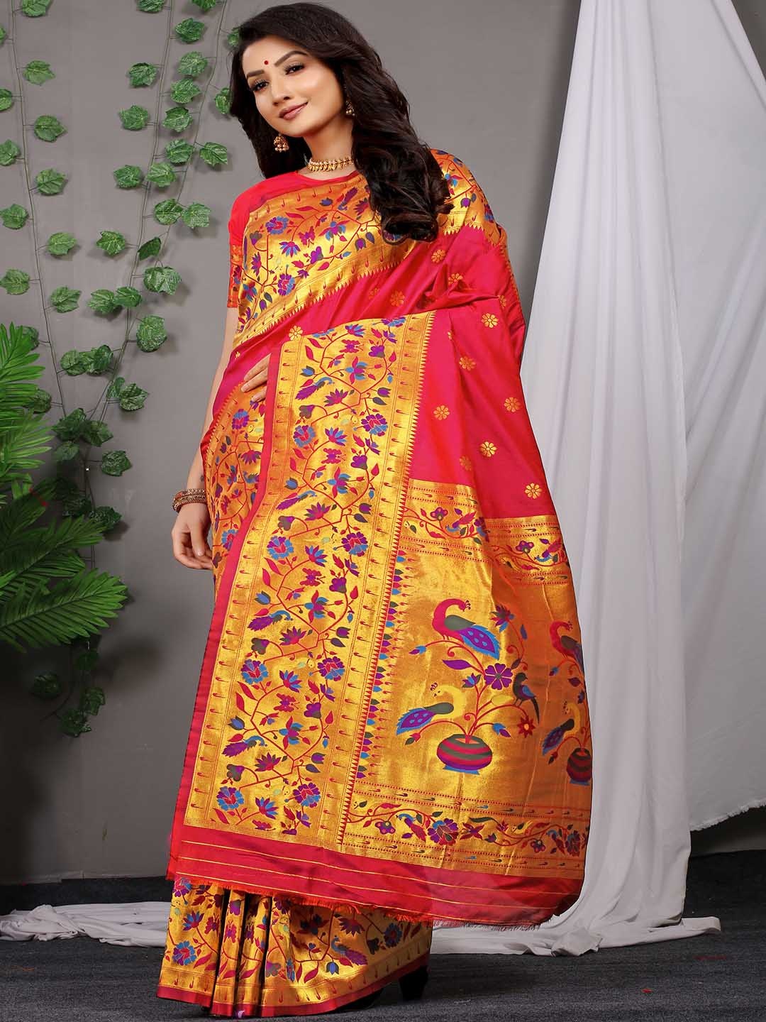 

Mitera Pink & Blue Ethnic Motifs Woven Design Zari Saree