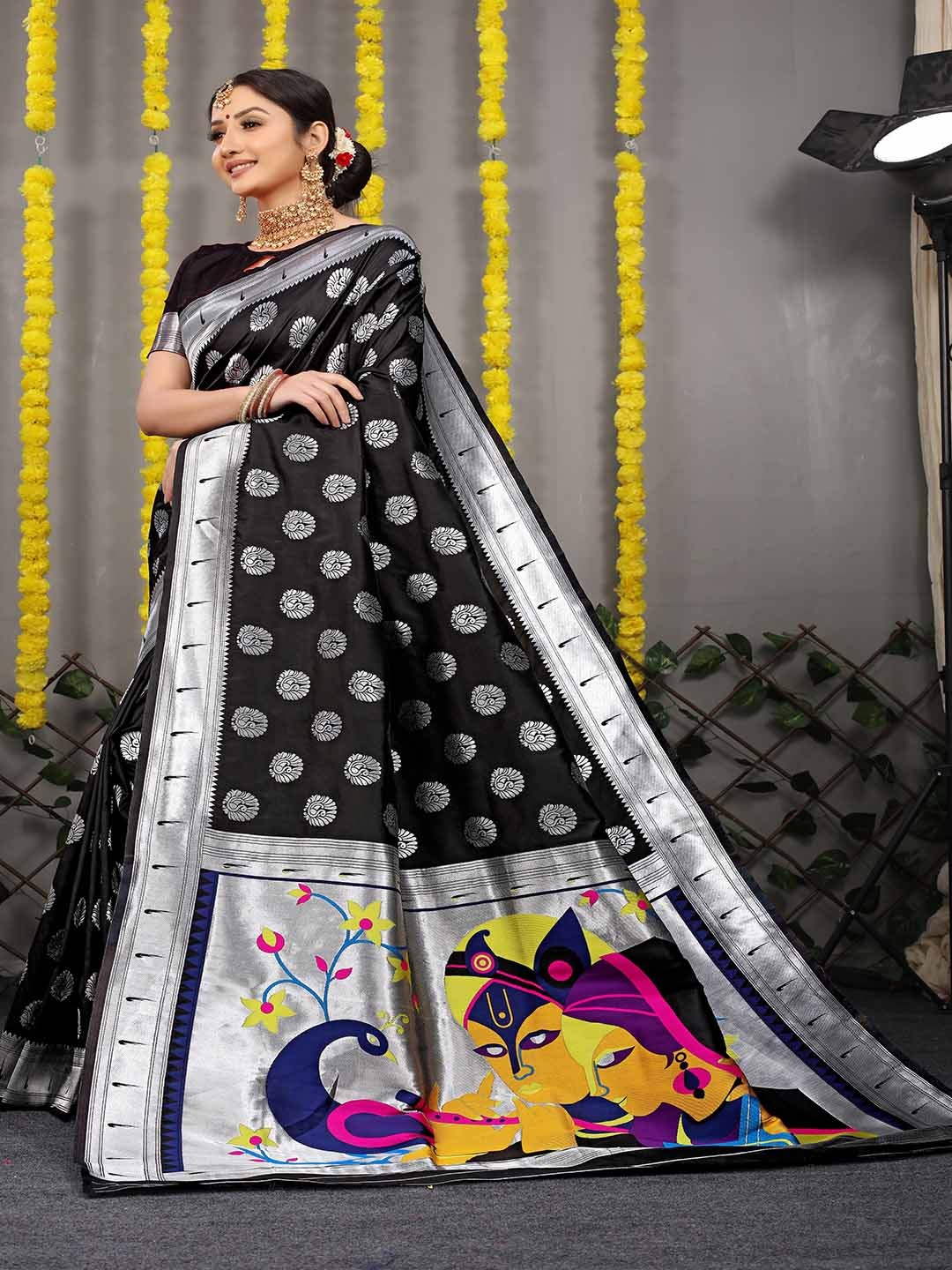 

Mitera Black & Yellow Ethnic Motifs Woven Design Zari Saree