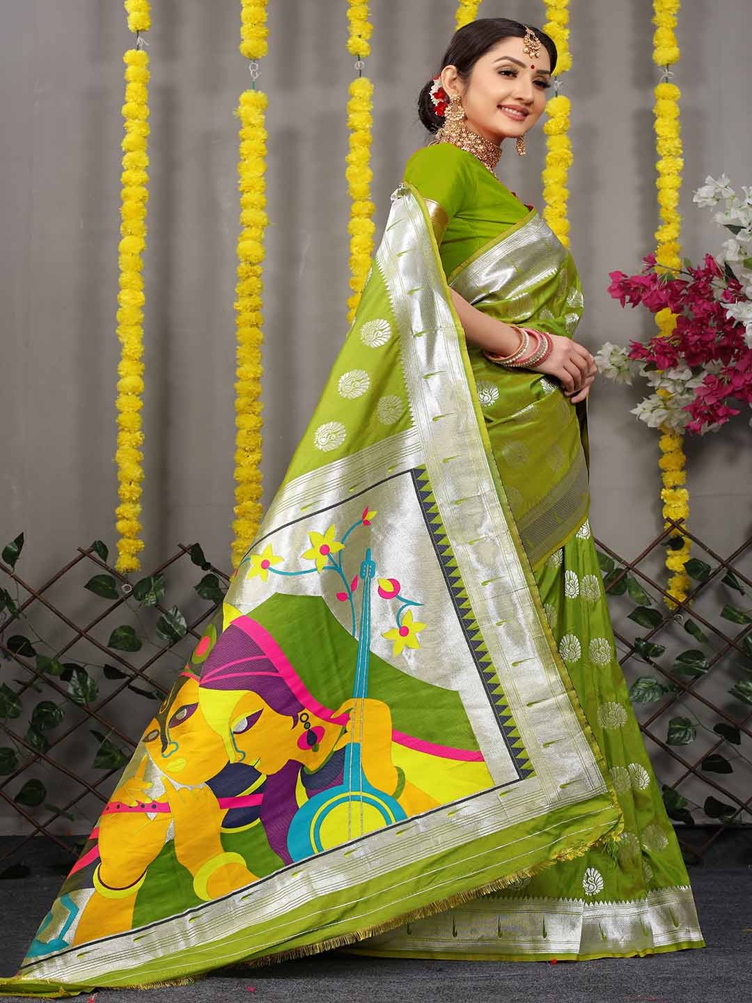 

Mitera Green & Yellow Ethnic Motifs Woven Design Zari Saree