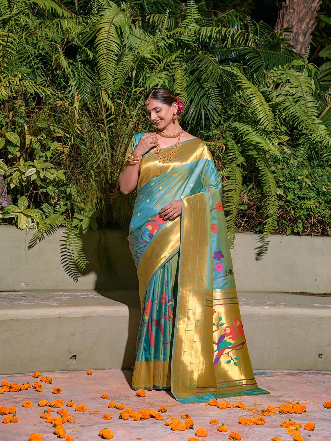 

Mitera Light Blue Woven Design Zari Art Silk Saree