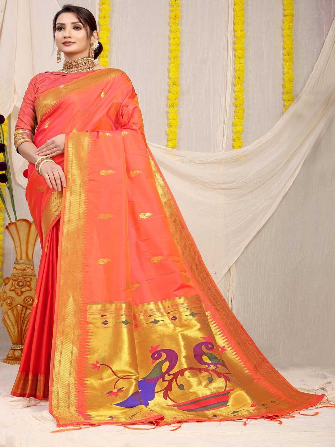 

Mitera Peach-Coloured & Gold-Toned Ethnic Motifs Woven Design Zari Saree