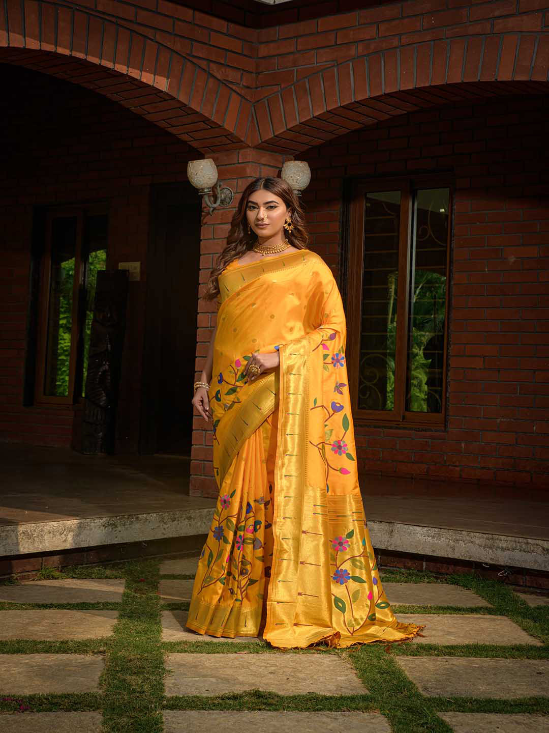 

Mitera Yellow & Gold-Toned Floral Printed Zari Art Silk Saree