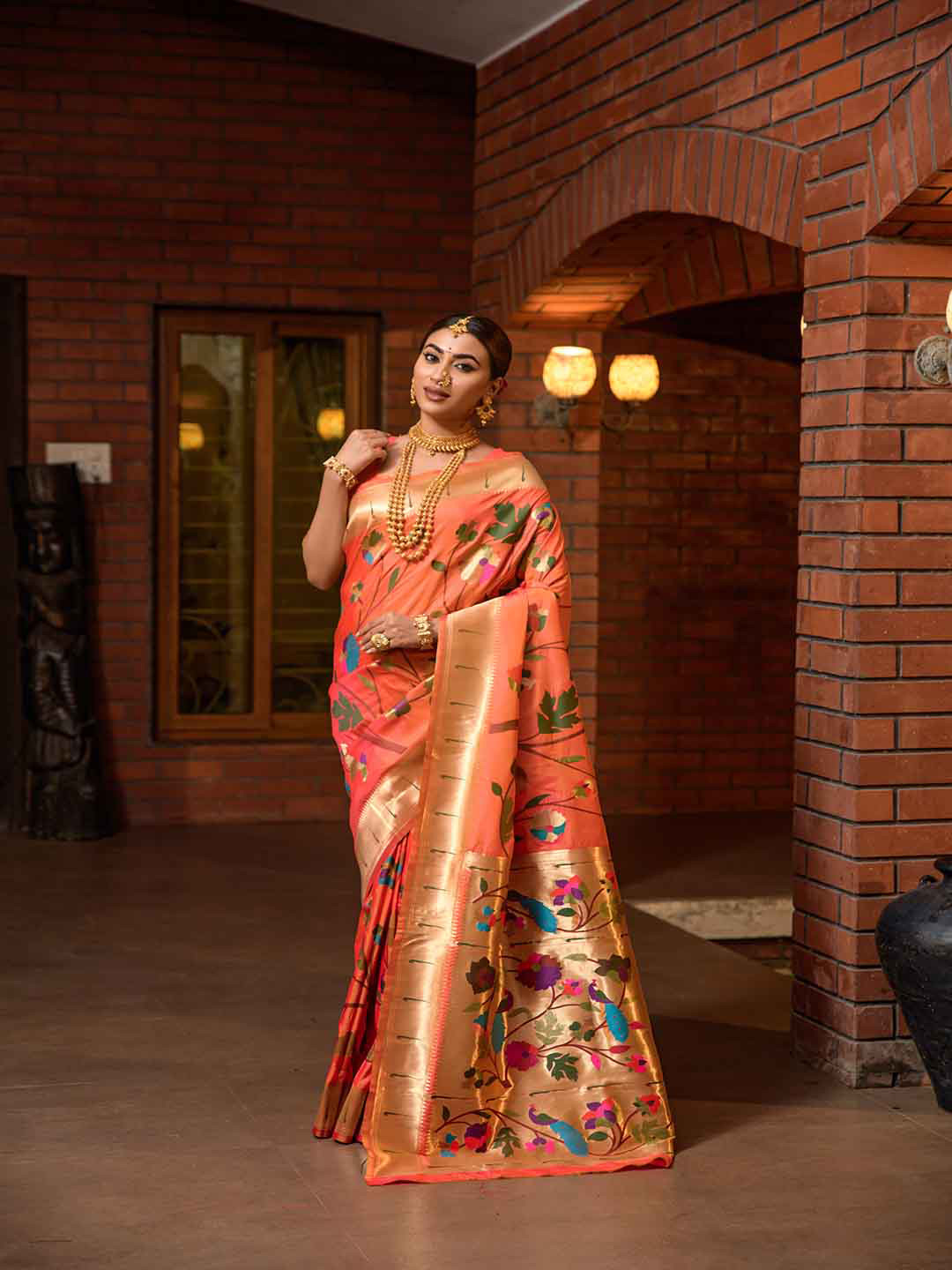 

Mitera Peach & Gold-Toned Woven Design Zari Art Silk Saree