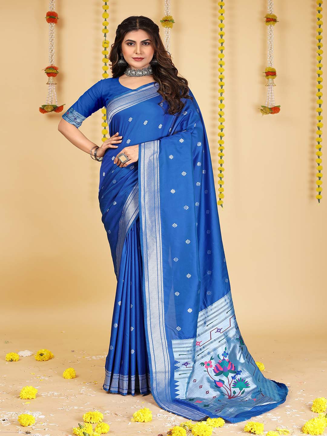 

Mitera Blue & Silver-Toned Ethnic Motifs Woven Design Zari Saree