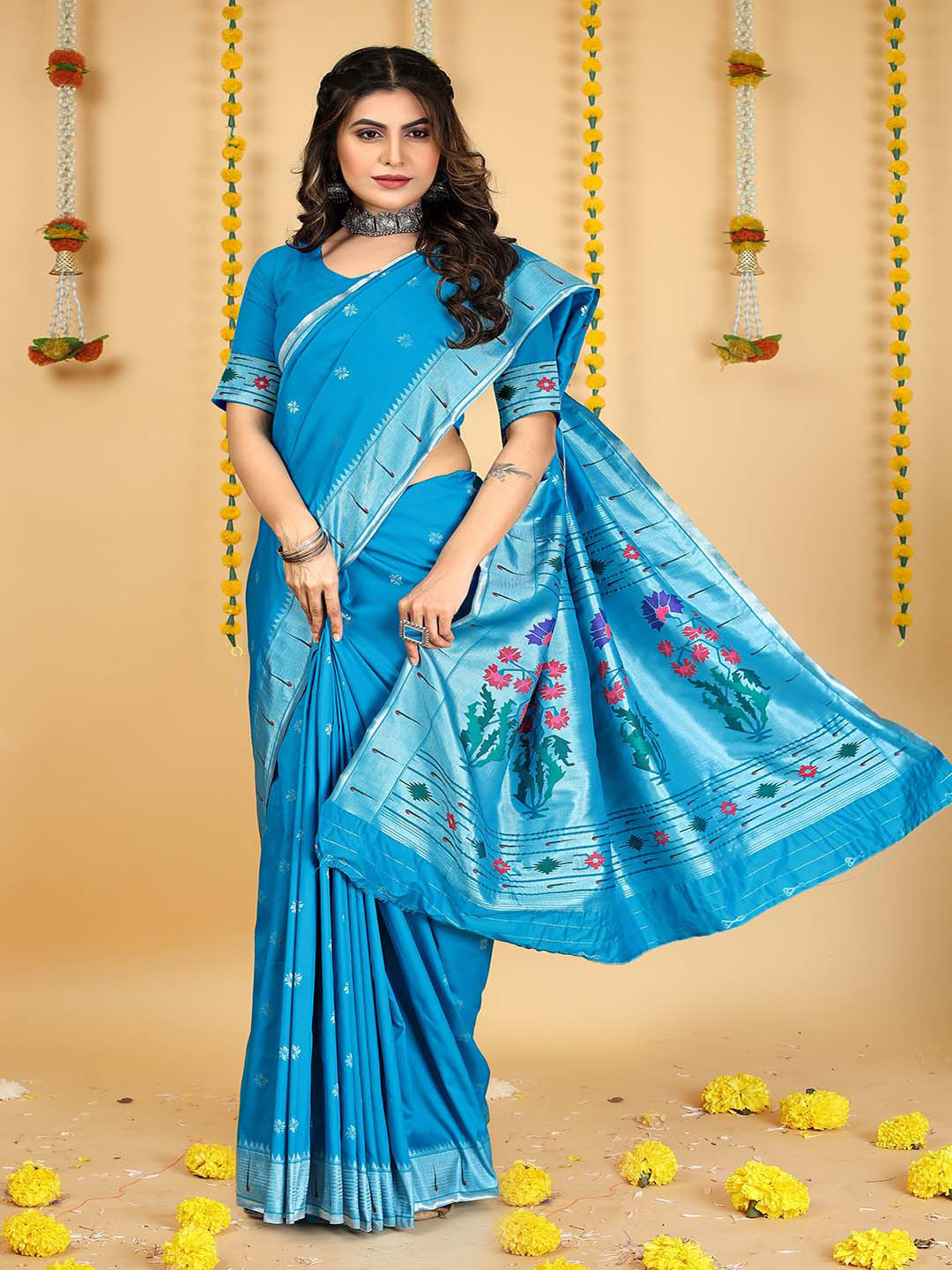

Mitera Blue & Silver-Toned Ethnic Motifs Woven Design Zari Saree