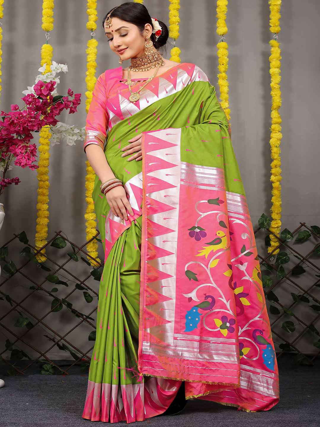 

Mitera Green & Pink Woven Design Zari Art Silk Saree