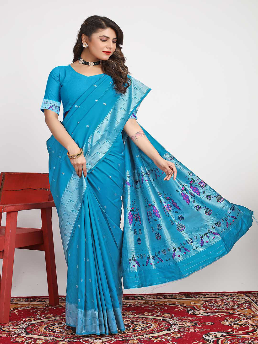 

Mitera Blue & Silver-Toned Ethnic Motifs Woven Design Zari Saree