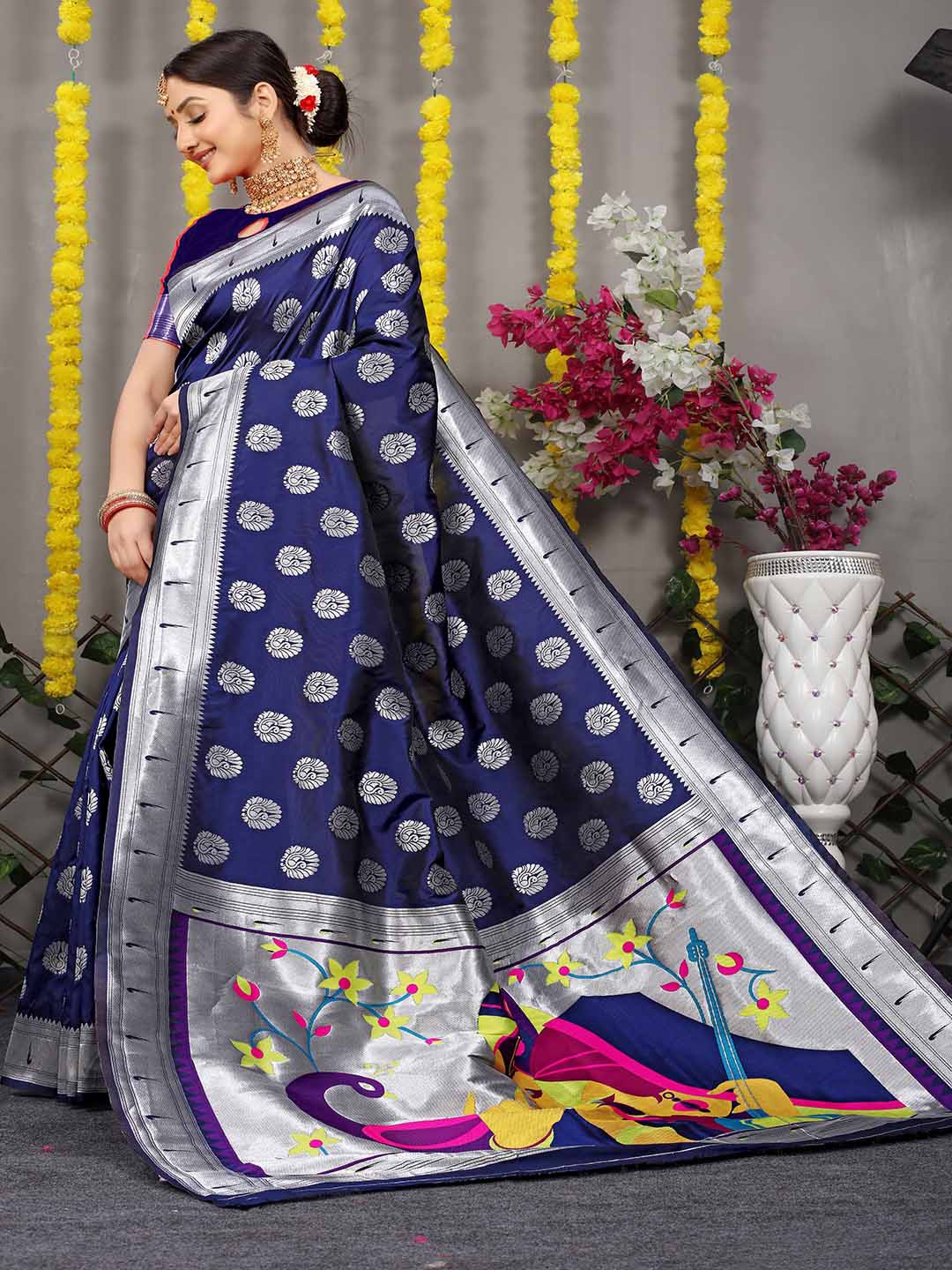 

Mitera Navy Blue & Silver-Toned Ethnic Motif Woven Design Zari Saree