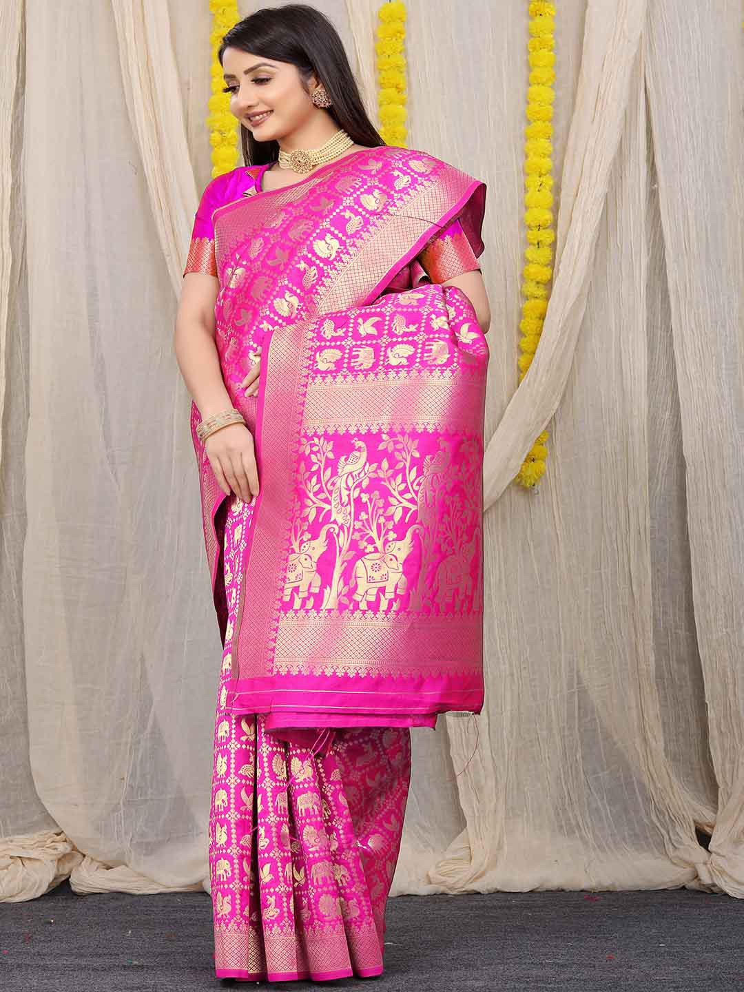 

Mitera Pink & Gold-Toned Ethnic Motifs Woven Design Zari Saree
