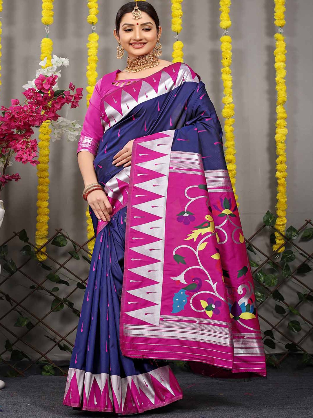 

Mitera Navy Blue & Pink Ethnic Motif Woven Design Saree