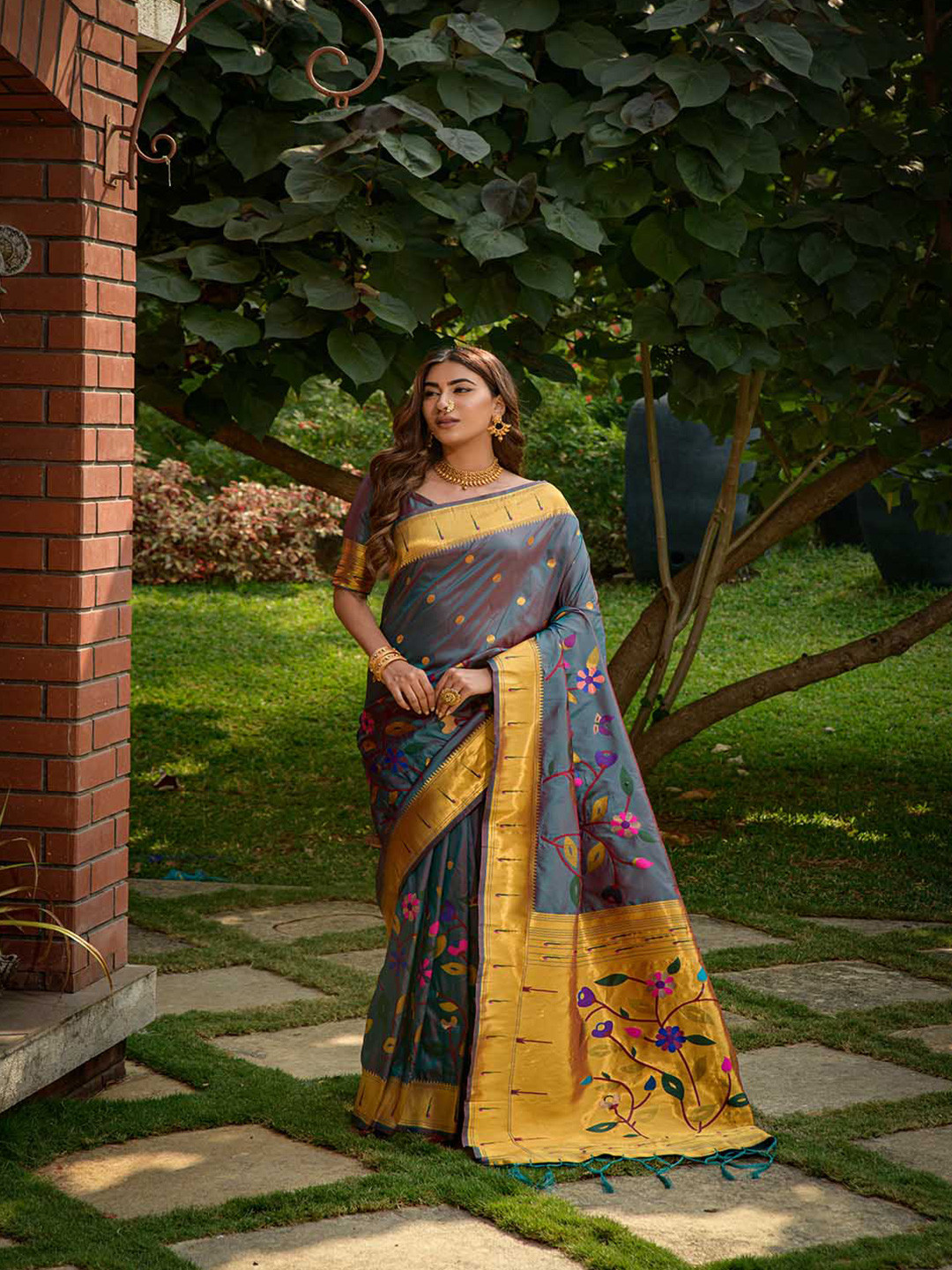 

Mitera Grey Ethnic Motifs Printed Art Silk Saree
