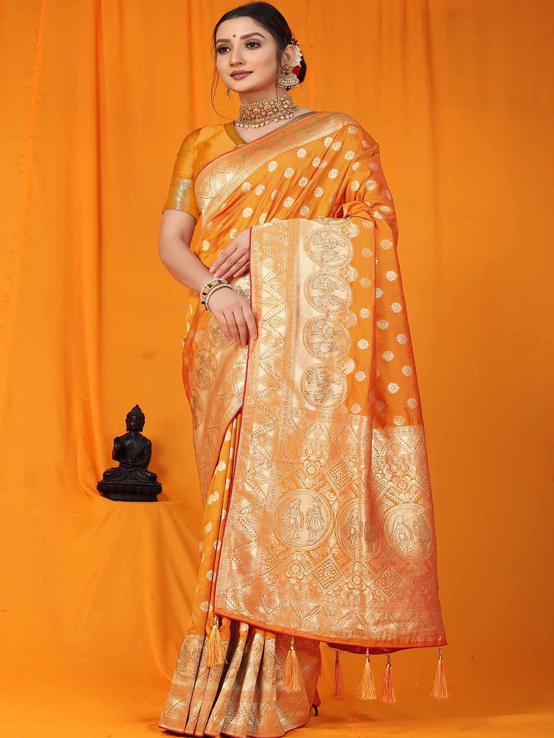 

Mitera Mustard & Gold-Toned Ethnic Motif Woven Design Zari Saree