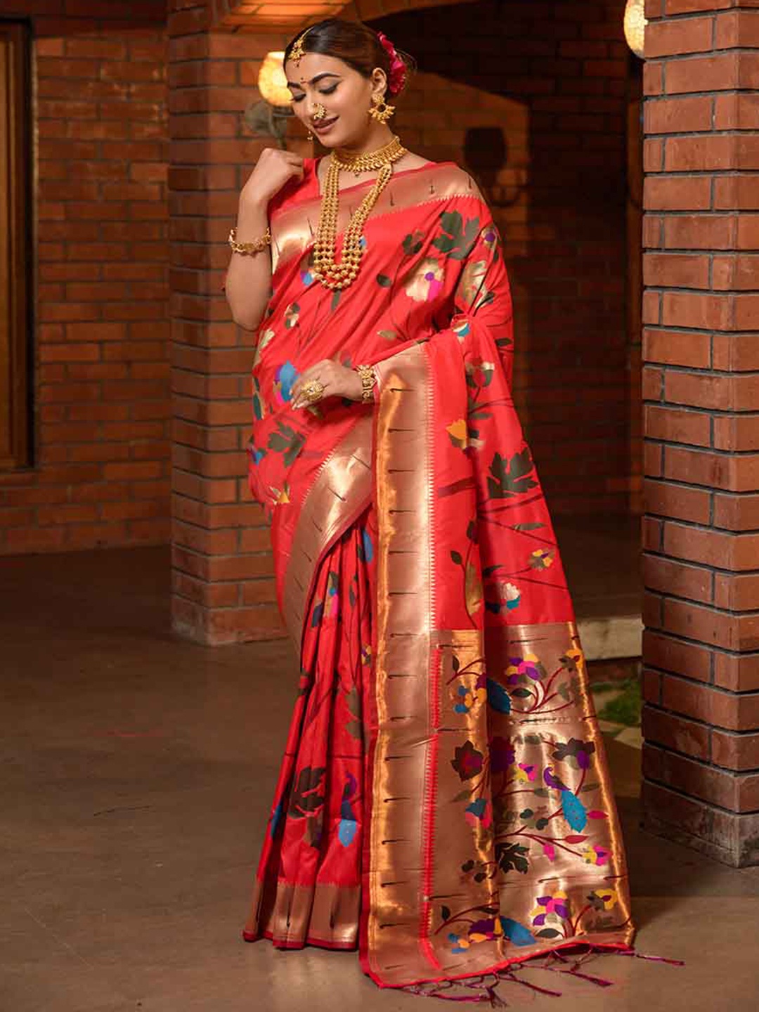 

Mitera Red & Green Ethnic Motifs Woven Design Zari Saree