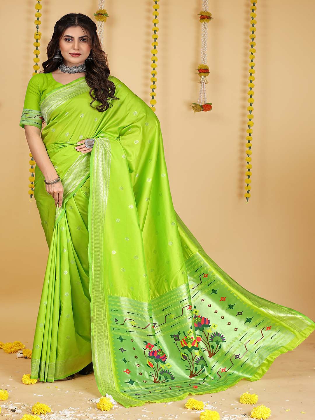 

Mitera Green & Violet Woven Design Zari Art Silk Saree
