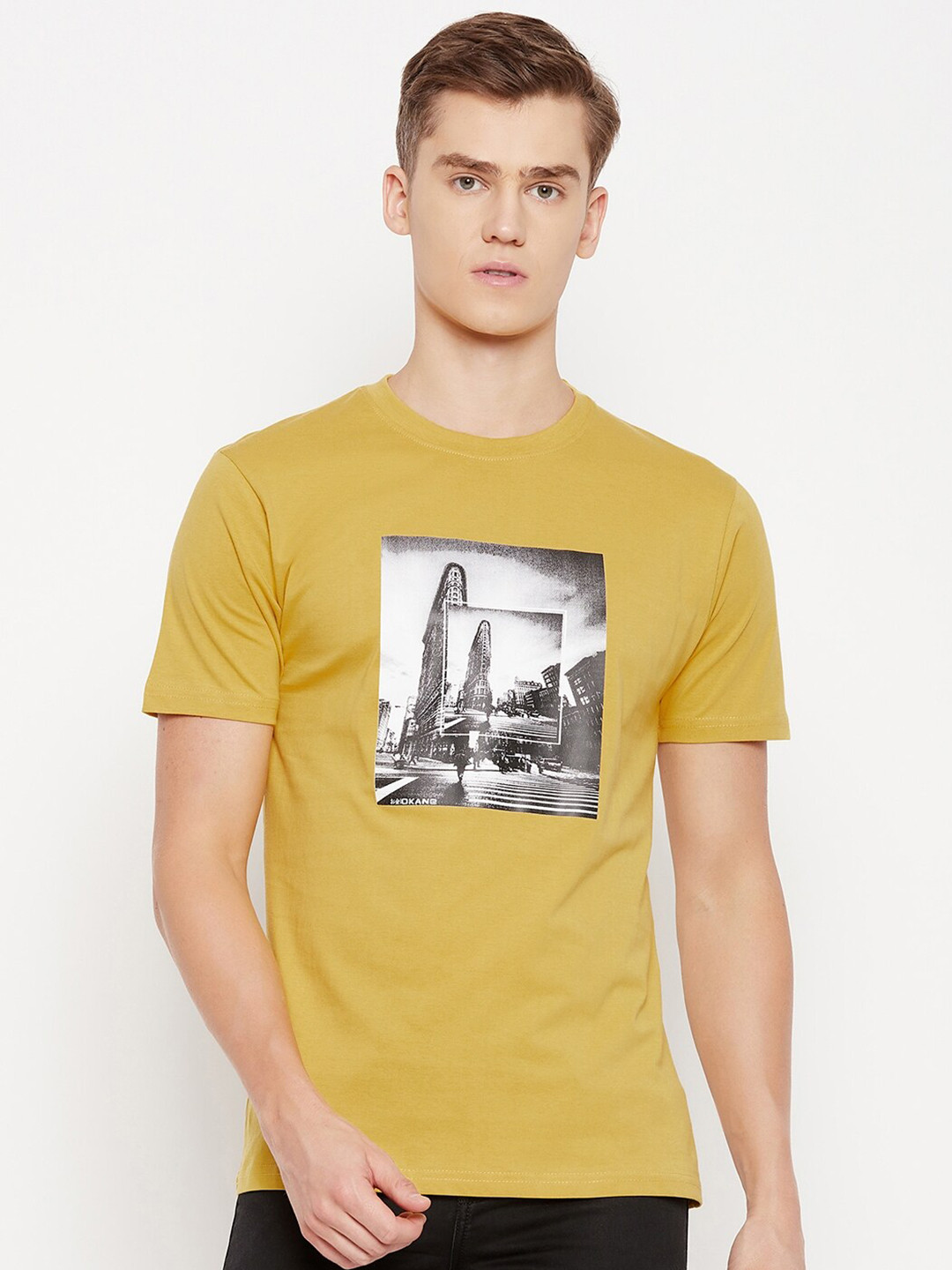 

Okane Men Green Graphic Printed Regular Fit Cotton T-shirt, Mustard