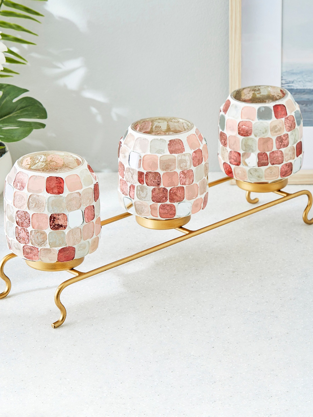 

Home Centre Corsica Peach Glass Votive Holder With Stand