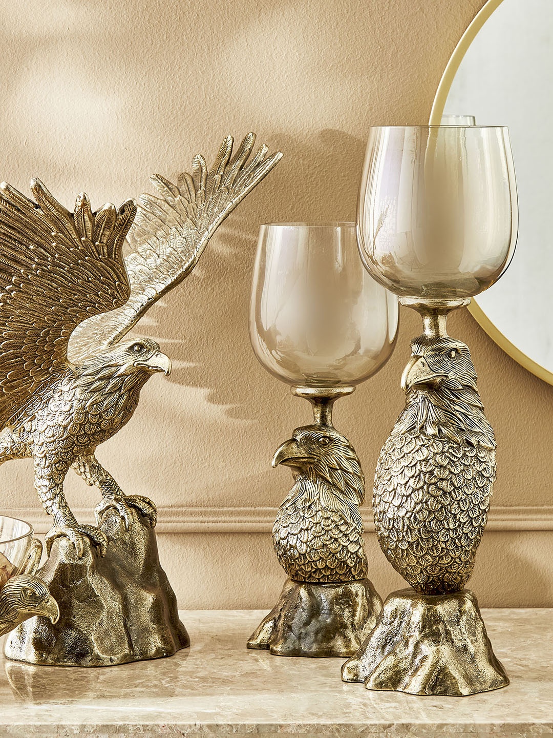 

Home Centre Gold-Toned Glass and Aluminium Hawk Hurricane Candle Holder