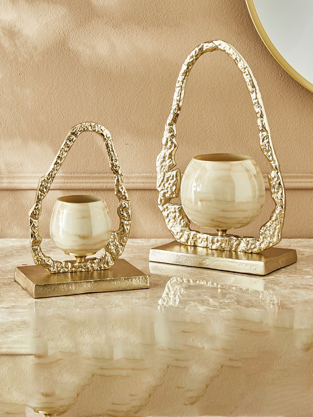 

Home Centre Eternity Vogue Glass and Aluminium T-light Holder, Gold