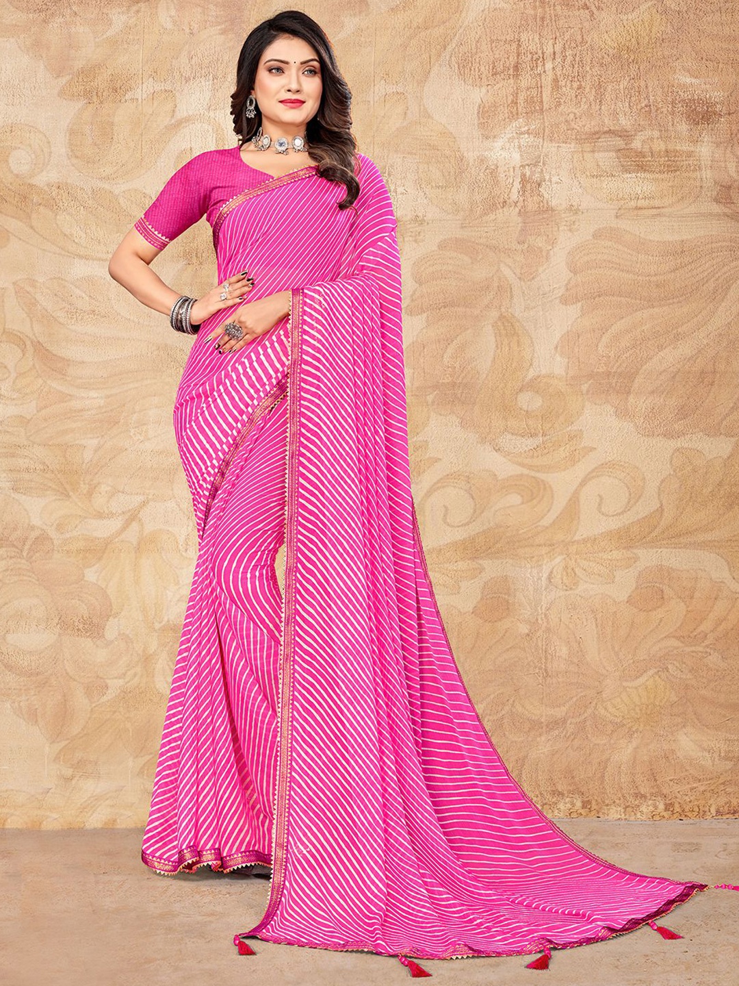

Mitera Pink & White Leheriya Printed Poly Chiffon Saree