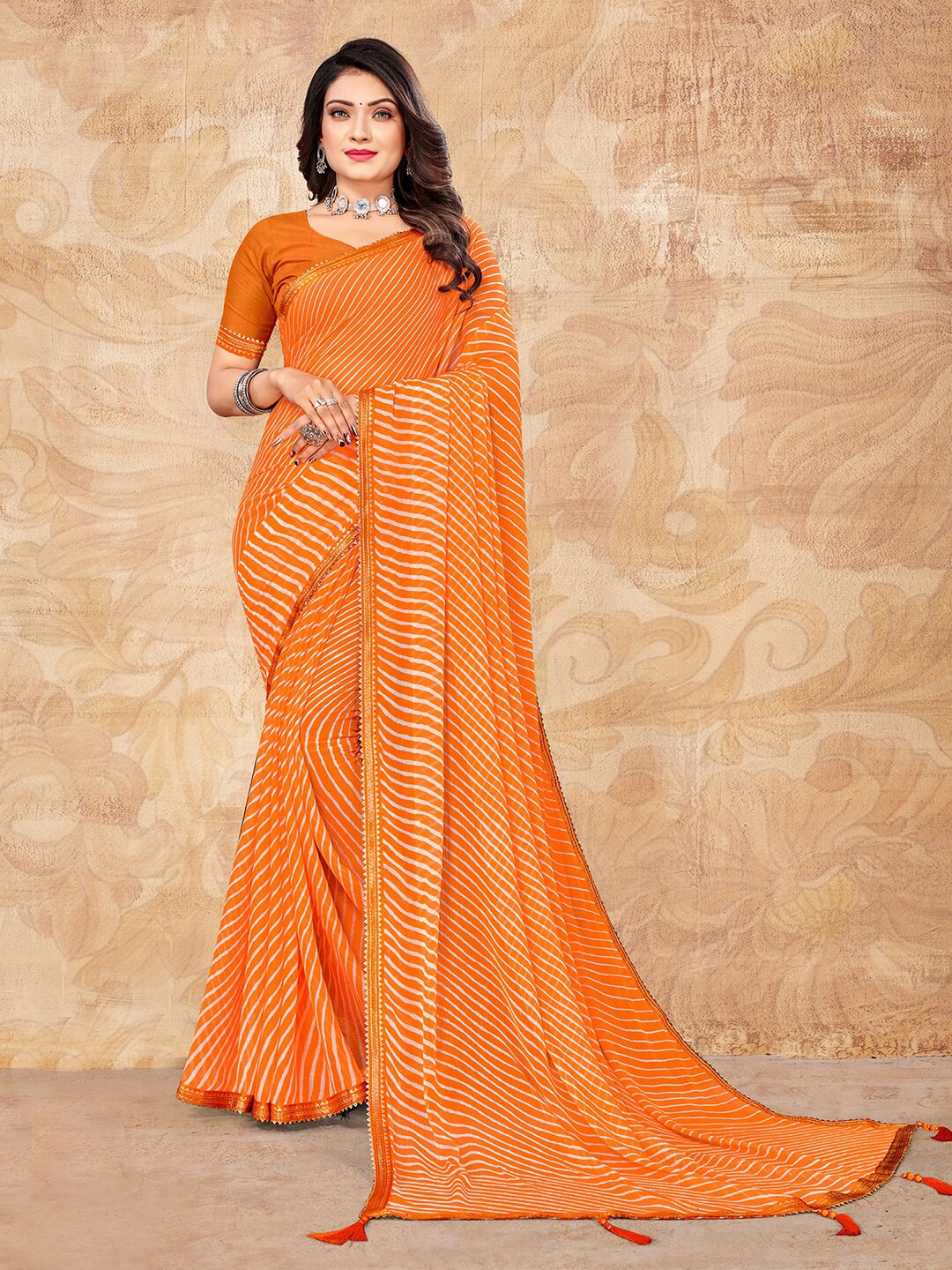 

Mitera Orange & White Leheriya Printed Saree