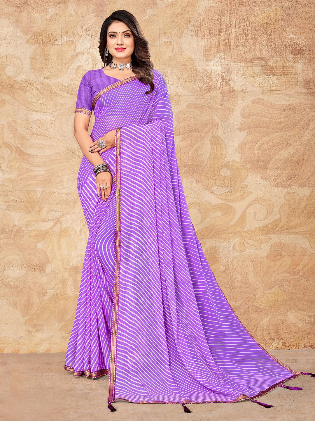 

Mitera Purple & Purple Leheriya Printed Saree