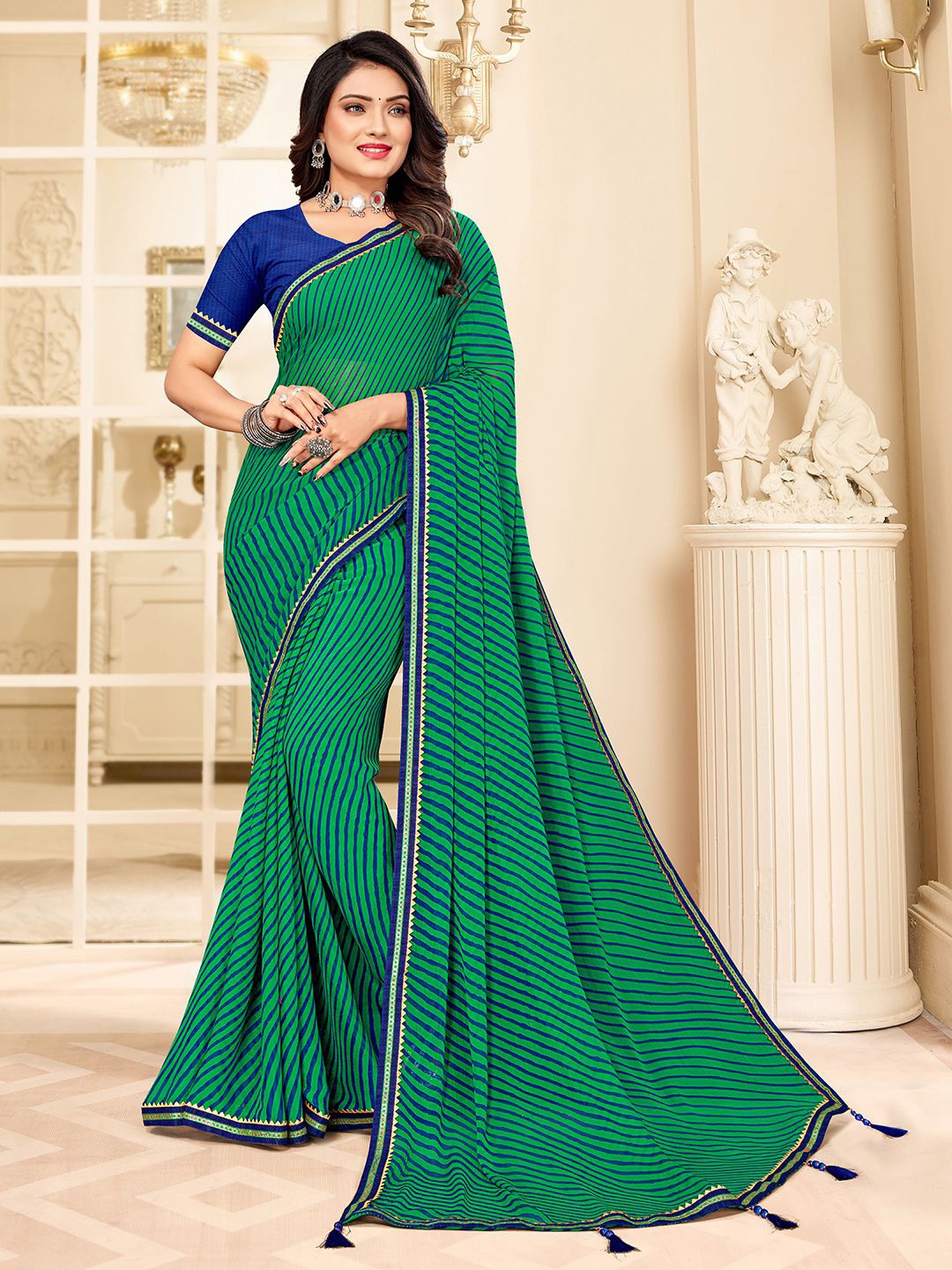 

Mitera Green & Blue Leheriya Printed Poly Chiffon Leheriya Saree