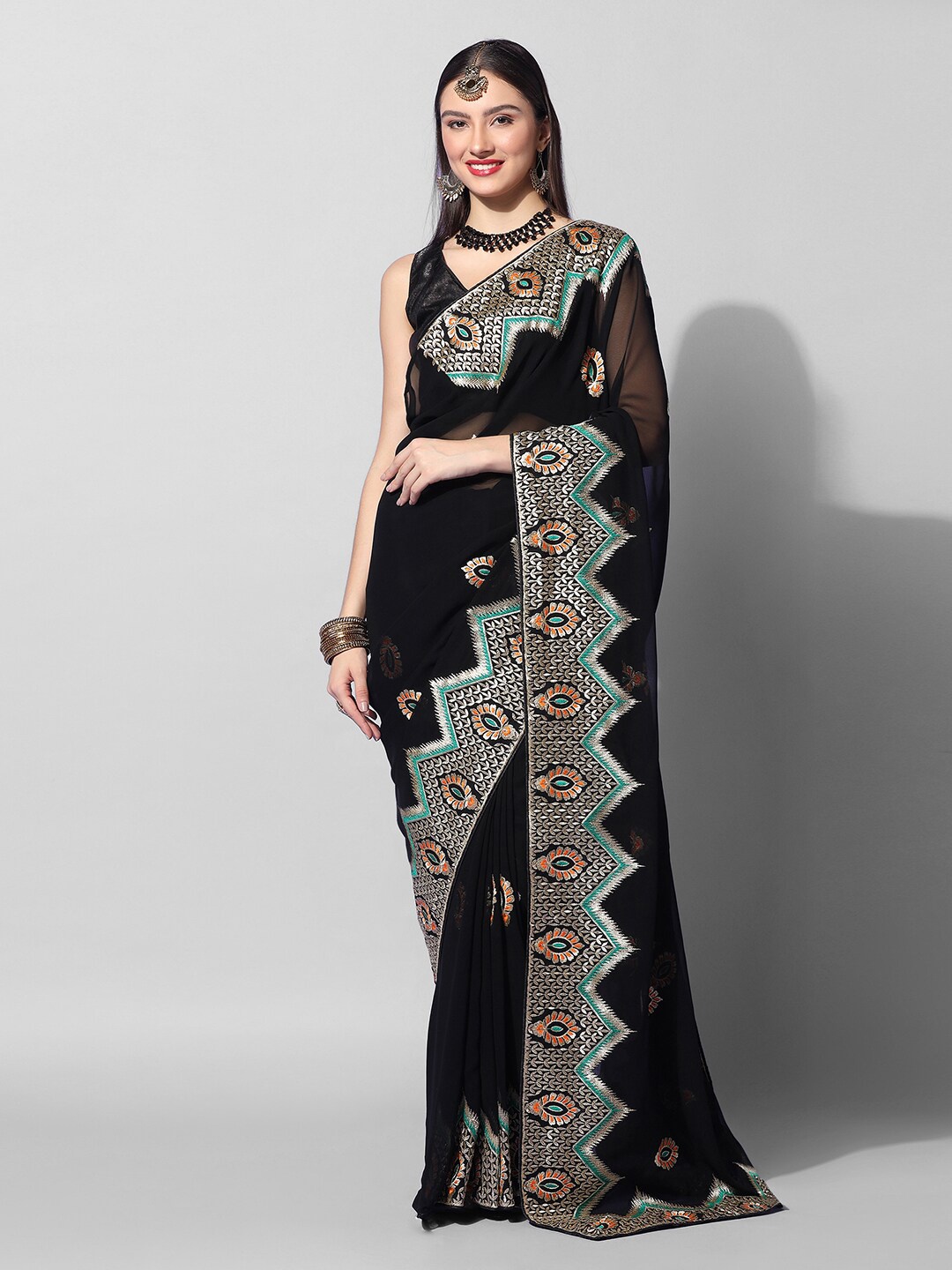 

Mitera Black & Silver-Toned Ethnic Motifs Embroidered Poly Georgette Saree