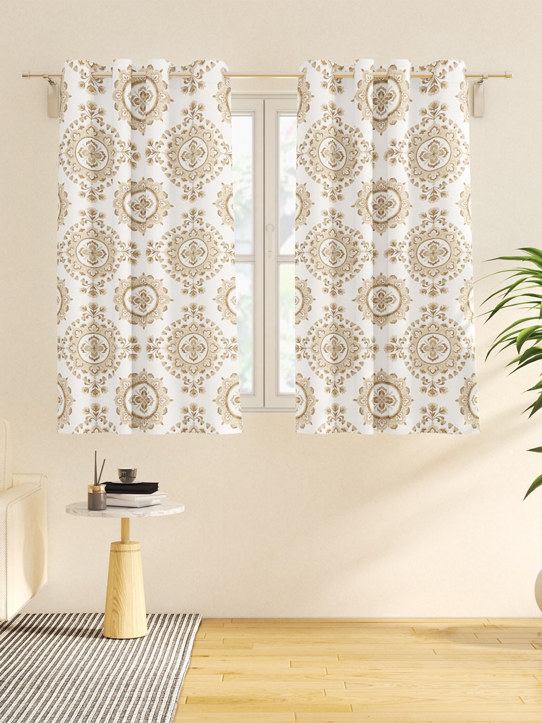 

Home Centre Saddle Beige & White 2 Pieces Ethnic Motifs Black Out Window Curtains