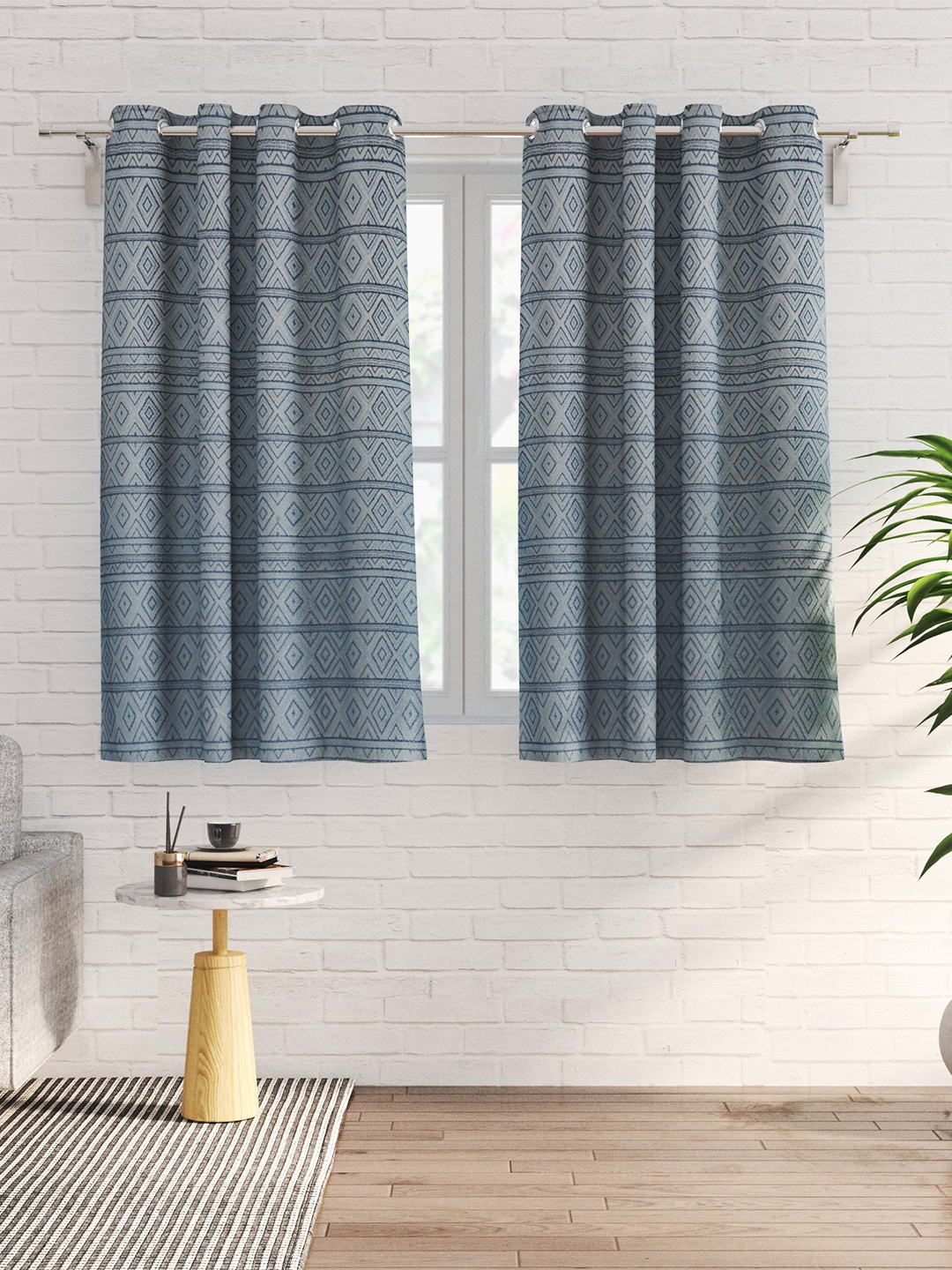 

Home Centre Sketch Blue 2 Pieces Geometric Printed Black Out Window Curtains