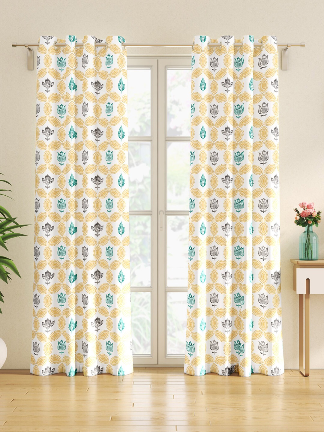 

Home Centre Saddle White & Yellow 2 Pieces Ethnic Motifs Printed Black Out Door Curtains