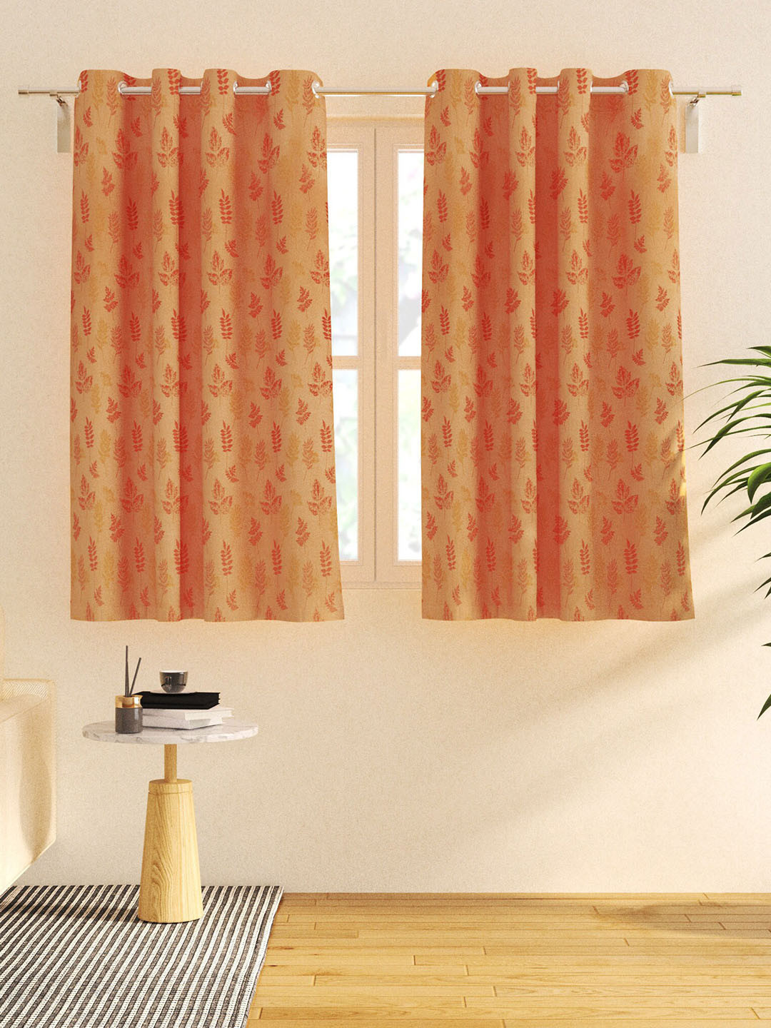 

Home Centre Orange & Brown 2 Pieces Floral Black Out Window Curtains