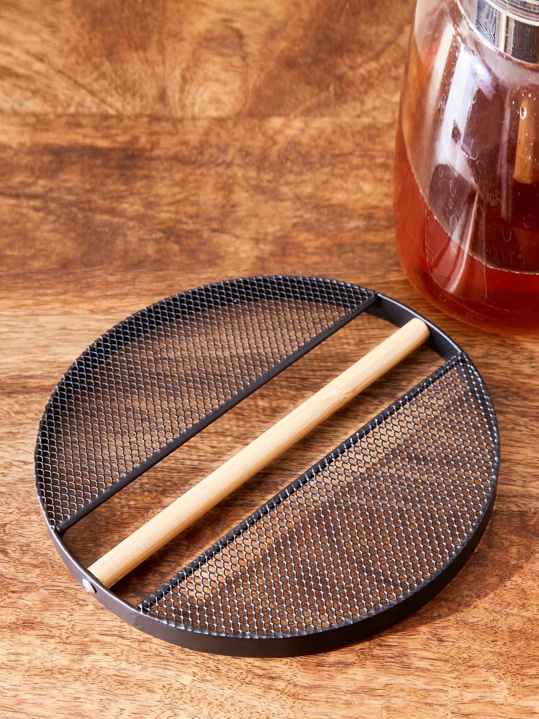 

Home Centre Chef Special Black Iron and Bamboo Trivet