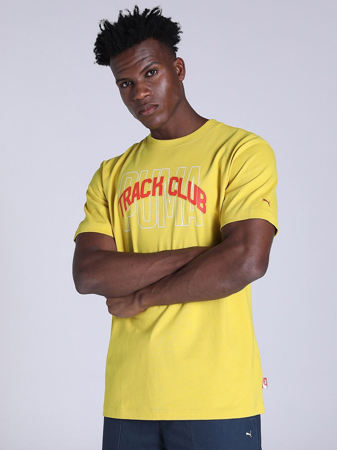 

Puma Men Track Meet Graphic Printed Relaxed Fit Cotton T-shirt, Yellow