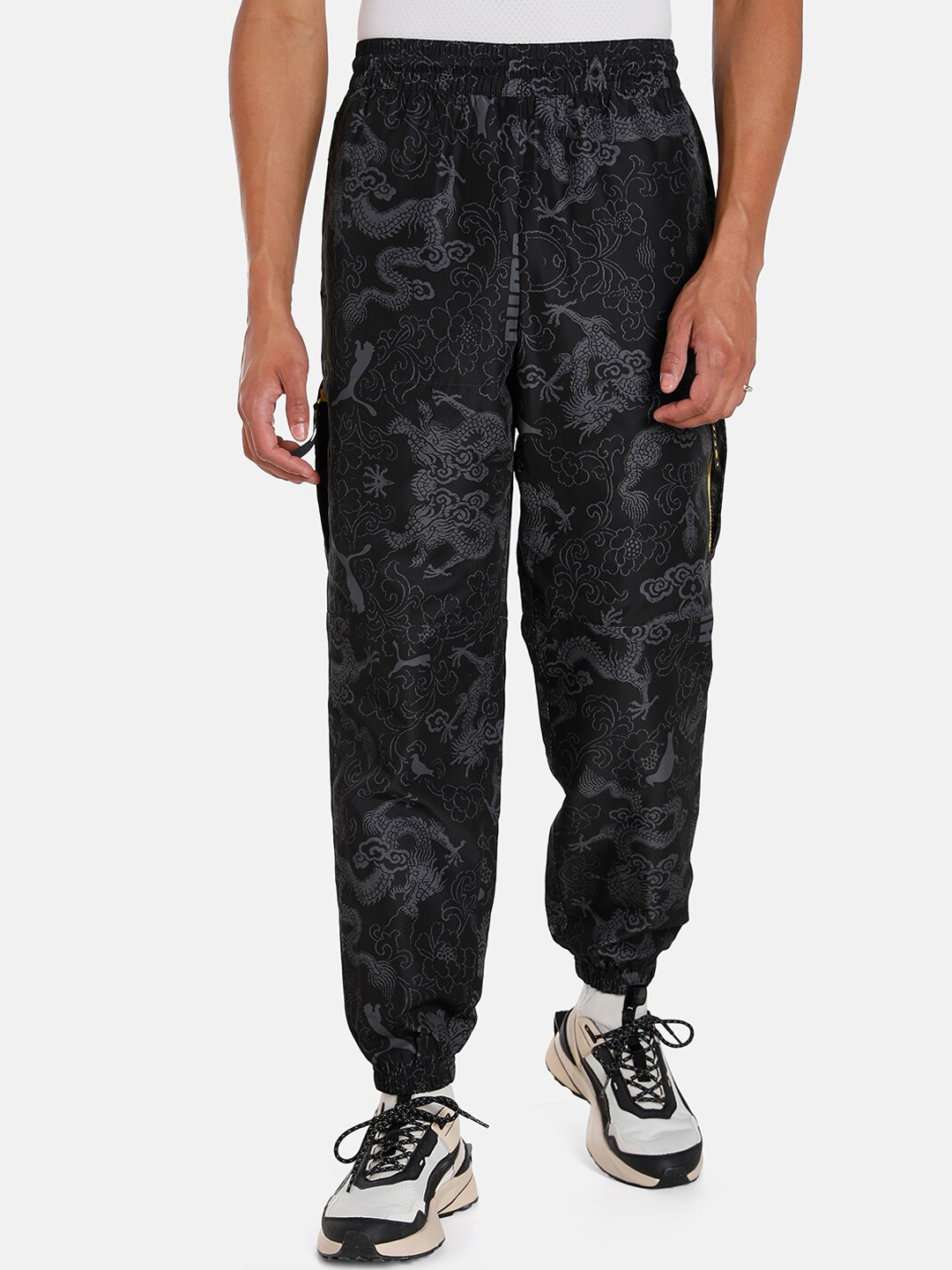 

Puma Men X STAPLE Woven Regular fit Sustainable Track Pants, Black