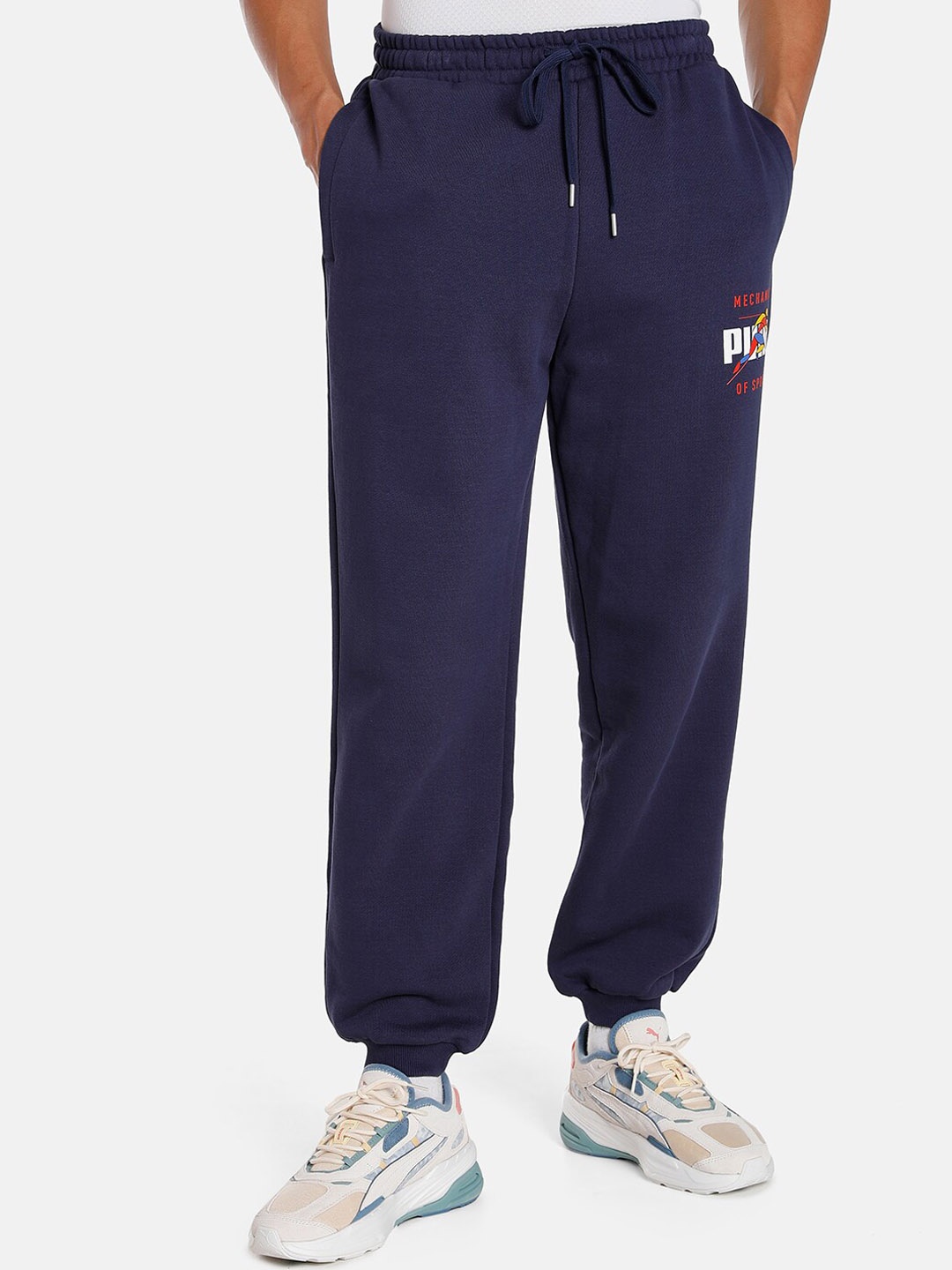 

Puma Men Track Meet Relaxed Fit Sustainable Joggers, Navy blue