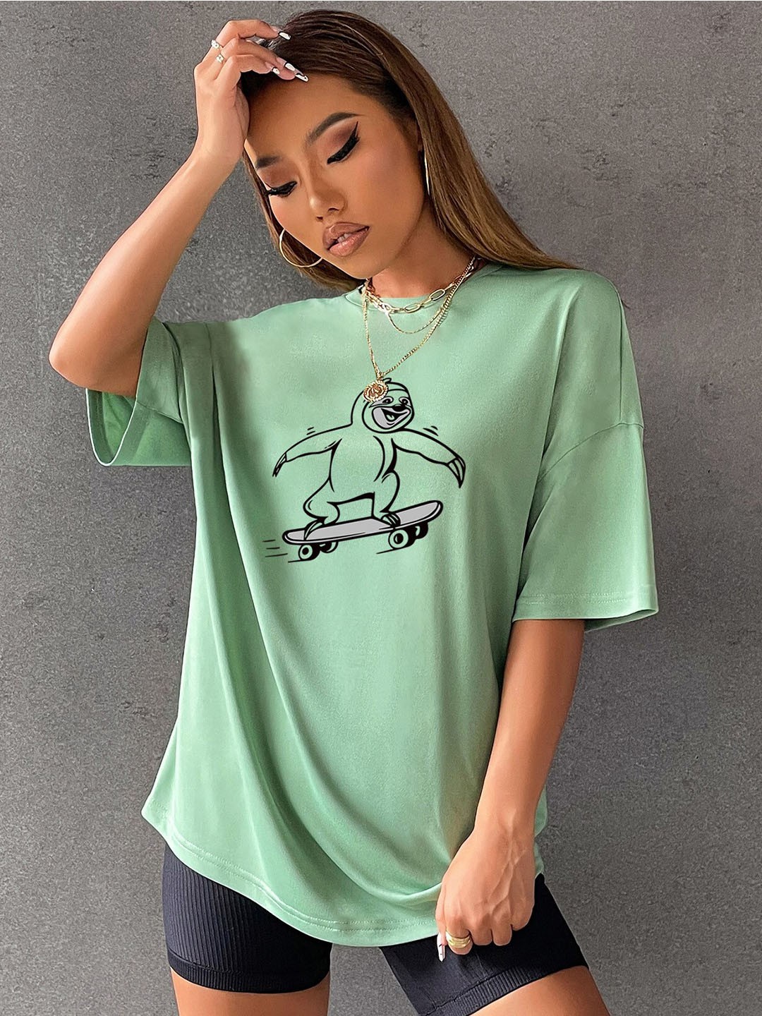 

StyleCast Green Coversational Printed Extended Sleeves Regular Top