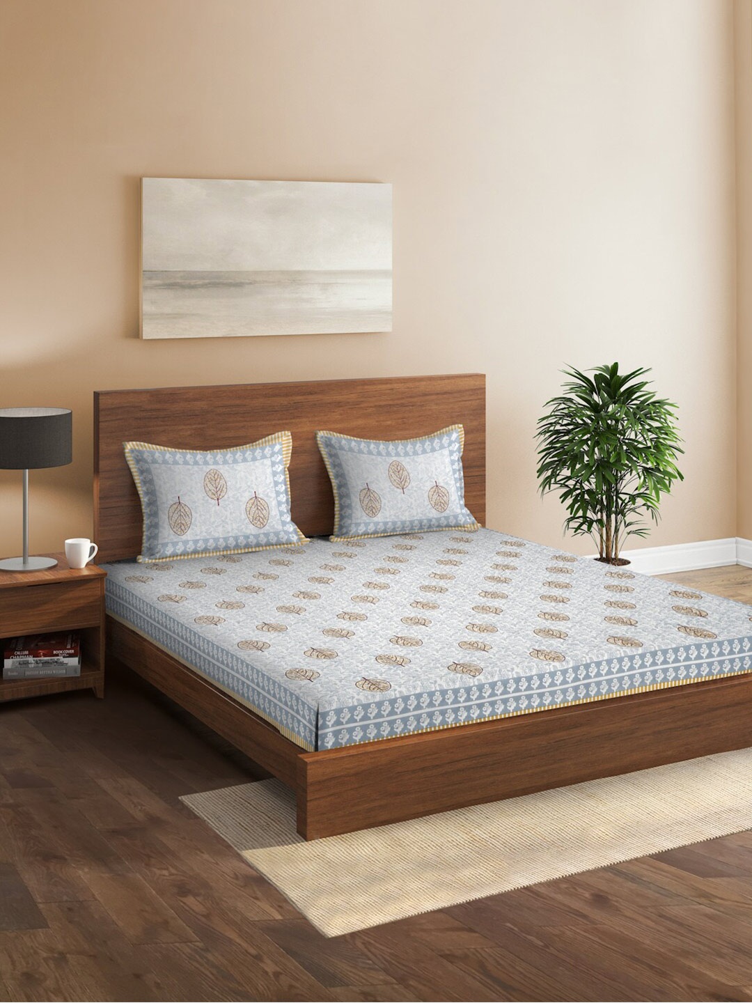

Sangria White & Blue Leaf Printed 180 TC Cotton King Bedsheet & 2 Pillow Covers