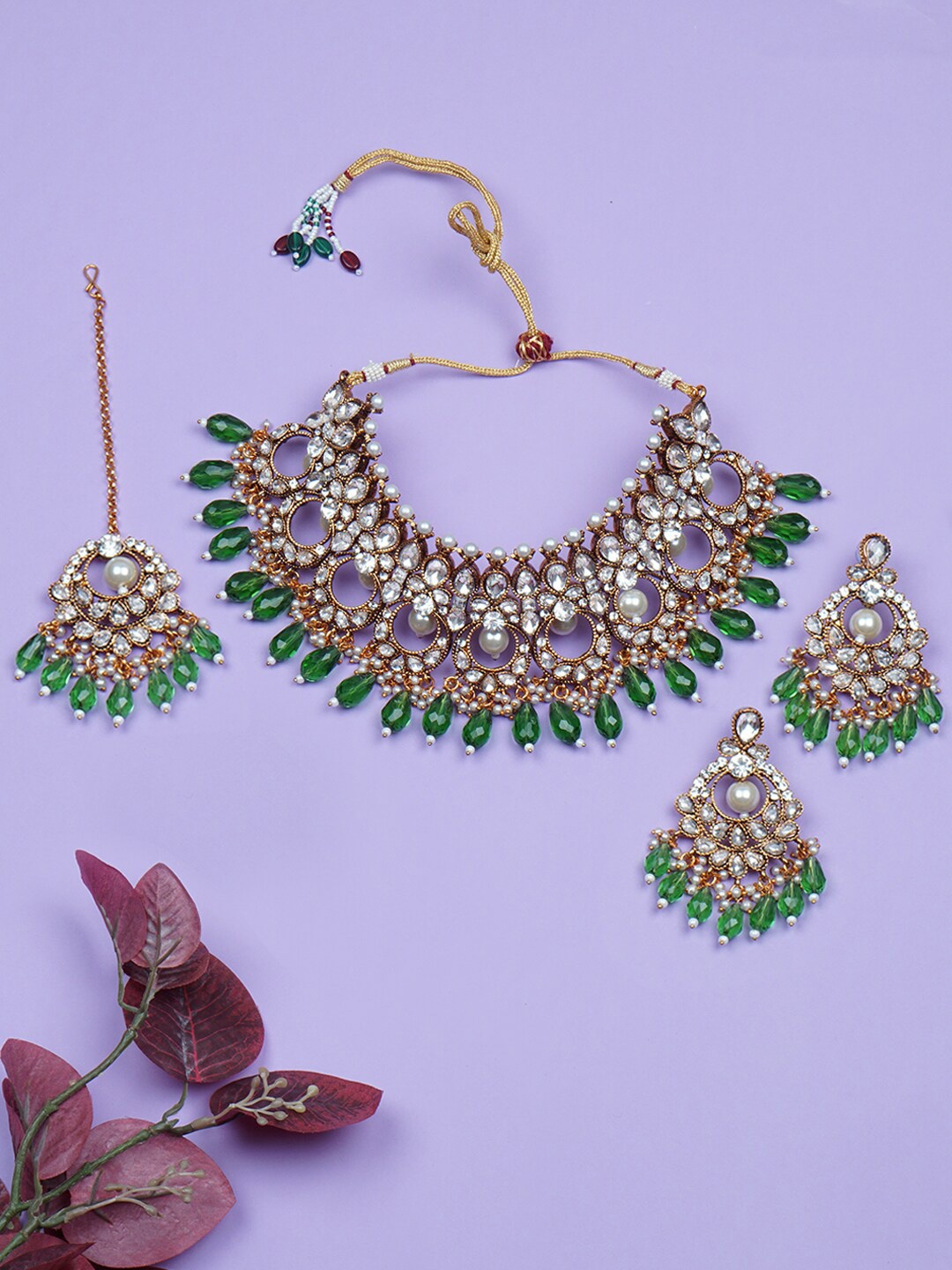 

Matushri Art Gold Plated Stone Studded & Beaded Jewelry Set