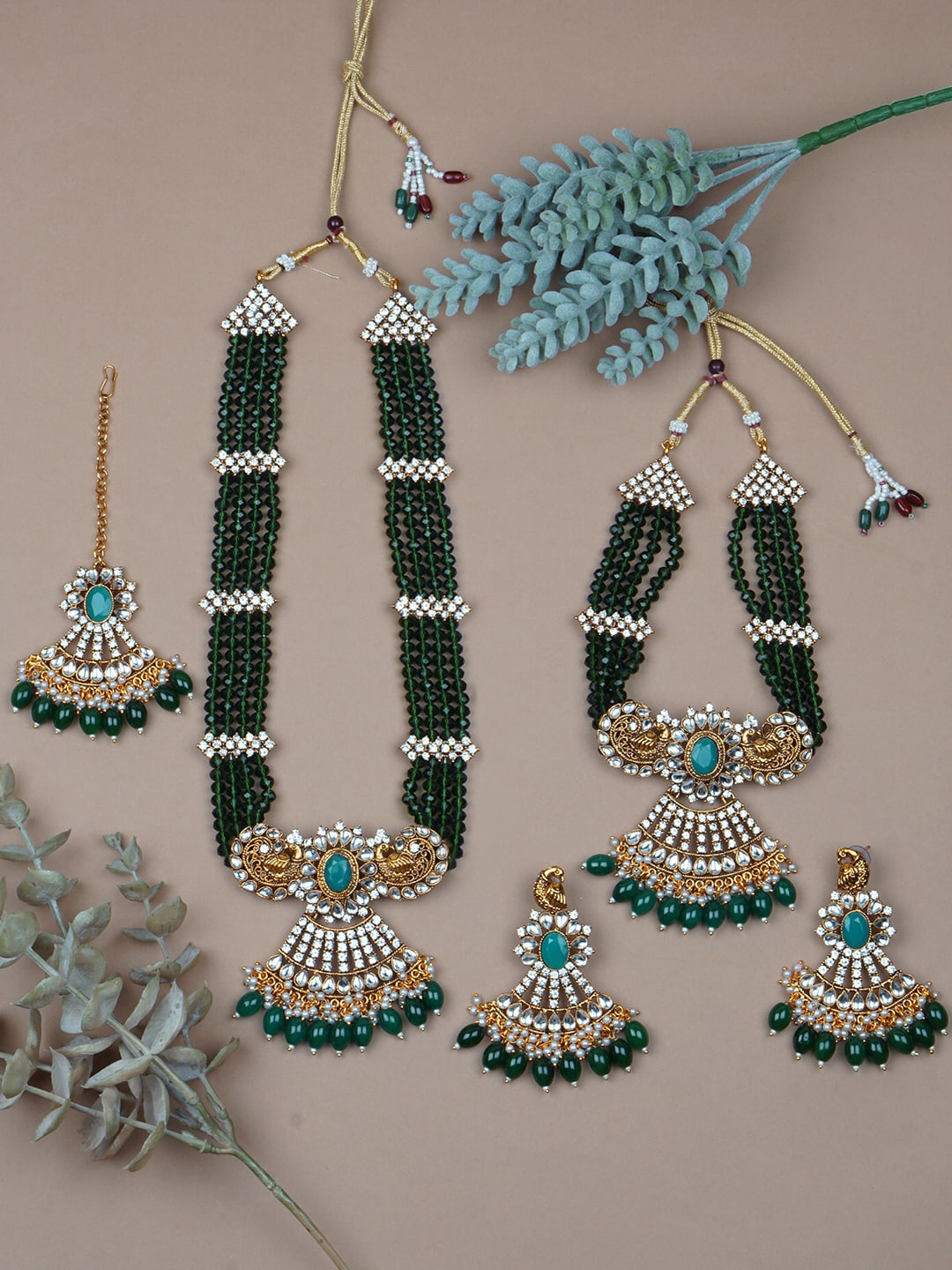 

Matushri Art Gold-Plated Kundan Studded & Beaded Jewellery Set
