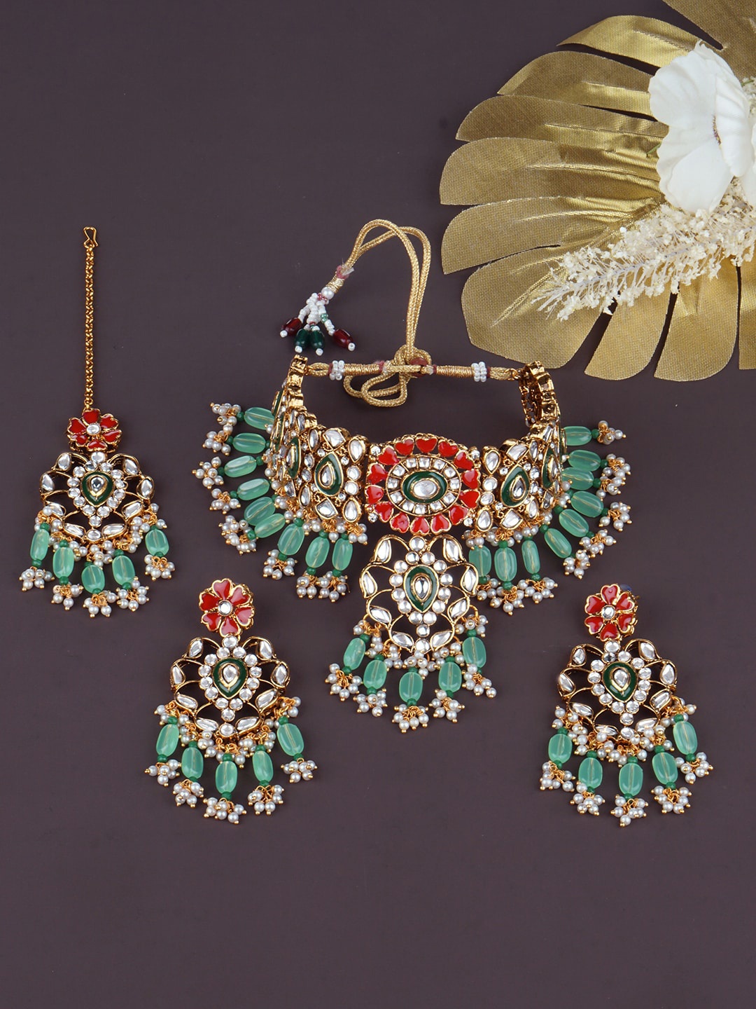 

Matushri Art Gold-Plated Artificial Stones & Beads Studded Jewellery Set