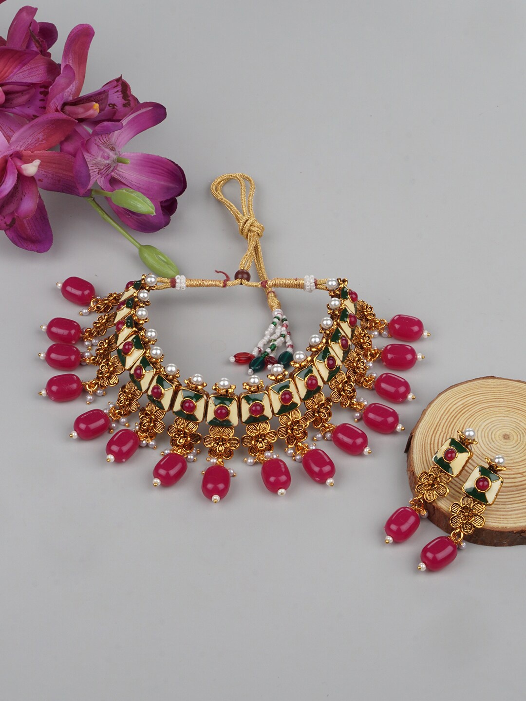 

Matushri Art Gold Plated Kundan Studded Choker Jewelry Set