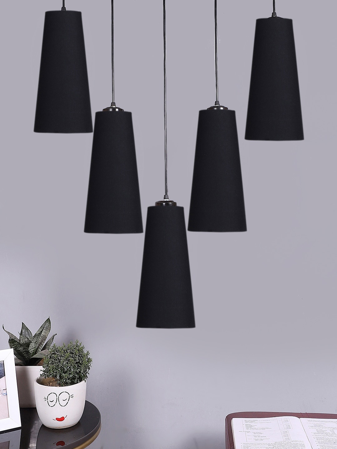 

Devansh Black Cotton Triangle Quintuple Hanging Lamp