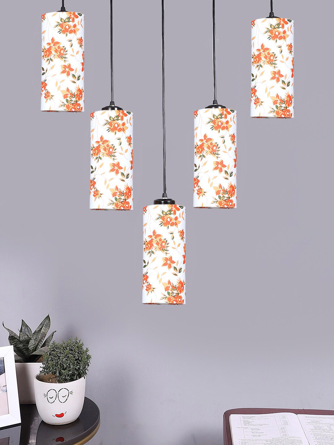 

Devansh White & Orange Coloured Floral Printed Cylinder Cotton Quintuple Hanging Lamp